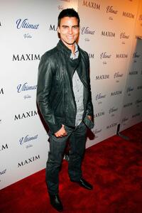 Colin Egglesfield at the December Maxim Issue with Ashley Greene.