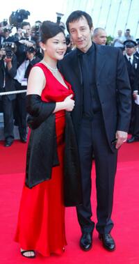 Jean-Hugues Anglade and companion at the opening ceremony at the 55th International Film Festival.