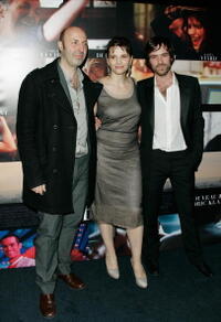 Director Cedric Klapisch, Juliette Binoche and Romain Duris at the premiere of "Paris."