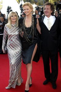 Britt Ekland, Charlize Theron and Geoffrey Rush at the screening of "The Life And Death Of Peter Sellers" during the 57th International Cannes Film Festival.