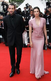 Jean Dujardin and Aure Atika at the premiere of "Il Caimano" during the 59th edition of the International Cannes Film Festival.