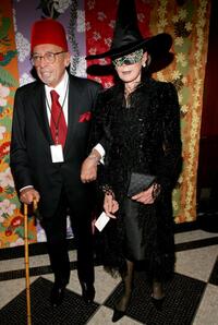 Ahmet Ertegun and his Wife Mica at the "Hulaween" a celebration of Bette Midlers 60th birthday.
