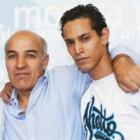 Director Abdelkrim Bahloul and Ouassini Embarek at the photocall of "Le Soleil Assassine" during the 60th Venice Film Festival.