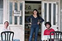 Rubi Moscovich as Itzik, Ronit Elkabetz as Dina, Shlomi Avraham as Papi in "The Band's Visit."