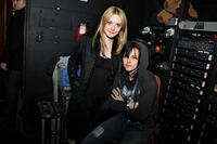 Dakota Fanning and Kristen Stewart backstage at Joan Jett’s concert at Sundance Film Festival 2010.