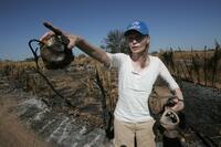 Mia Farrow at the burned village in Tamadjour.