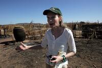 Mia Farrow at the burned village in Tamadjour.