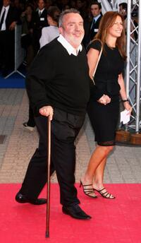 Dominique Farrugia and his wife at the premiere of "The Devil Wears Prada" during the 32nd Deauville Festival of American Film.