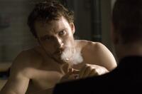 Michael Fassbender as Bobby Sands and Liam Cunningham as Father Dominic Moran in "Hunger."