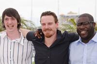 Brian Milligan, Michael Fassbender and Director Steve McQueen at the photocall of "Hunger" during the Cannes International Film Festival.