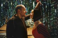 Dany Boon as Bazil and Julie Ferrier as Elastic Girl in "Micmacs."