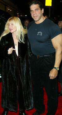 Lou Ferrigno and guest at the 25th anniversary celebration of the film "Pumping Iron."