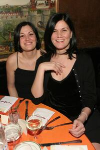 Linda Fiorentino and guest at the Entertainment Weekly's Oscar Viewing Party.