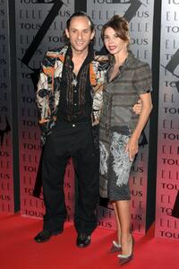 Victoria Abril and Custo Dalmau at ELLE Magazine XX Anniversary Party.