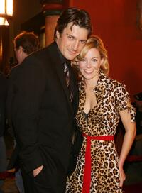 Nathan Fillion and Elizabeth Banks at the premiere of "Slither."