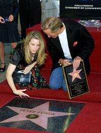 Bridget Fonda and her father Peter Fonda at the ceremony honoring him with a star on the Hollywood Walk of Fame.