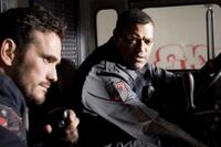 Matt Dillon and Laurence Fishburne in "Armored."