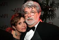 Carrie Fisher and George Lucas at the 33rd AFI Life Achievement Award after party.