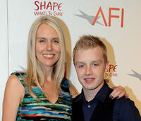 Director Lisa Robertson and Noel Fisher at the California premiere of "Battle: Los Angeles."