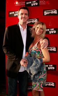 Neil Flynn and Guest at the DVD Launch Party for First Season of Scrubs.