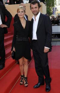 Marina Fois and Eric Lartigau at the screening of "Fair Game" during the 63rd Annual Cannes Film Festival.