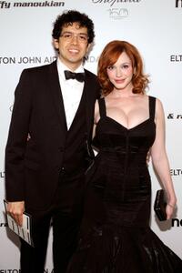 Geoffrey Arend and Christina Hendricks at the 18th Annual Elton John AIDS Foundation Academy Awards Party.