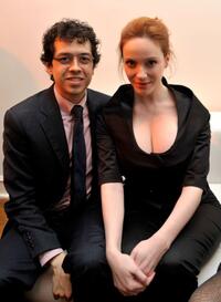 Geoffrey Arend and Christina Hendricks at the Kimberly Brooks "The Stylist Project" exhibition.