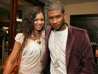 Jennifer Freeman and Usher at the launch party for Usher's "Truth Tour" DVD.
