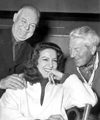Jean Gabin, Maria Felix, Jean Renoir and Jean Gabin during filming of "French Cancan".
