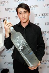 Alex Frost at the Belvedere Luxury Lounge in honor of 80th Academy Awards.