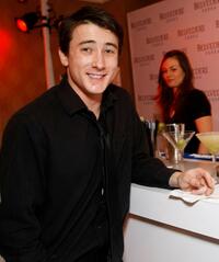 Alex Frost at the Belvedere Luxury Lounge in honor of 80th Academy Awards.