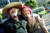 M.C. Gainey and guest at the premiere of "The Dukes of Hazzard."