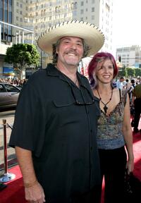 M.C. Gainey and guest at the premiere of "The Dukes of Hazzard."