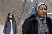 Isabelle Fuhrman as Esther and CCH Pounder as Sister Abigail in "Orphan."