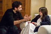 Director Jaume Collet-Serra and Isabelle Fuhrman on the set of "Orphan."