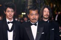 Joe Odagiri, Tatsuya Fuji and director Kiyoshi Kurosawa at the screening of "Akarui Mirai" during the 56th Cannes Film Festival.