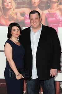 Billy Gardell and Guest at the California premiere of "Bridesmaids."