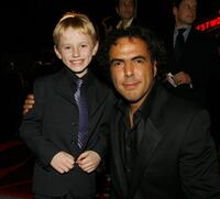 Nathan Gamble and Director Alejandro Gonzalez Inarritu at the premiere of "Babel."