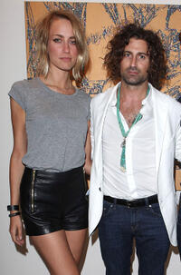Ruta Gedmintas and artist Todd DiCiurcio at the Todd DiCiurcio "Gold" Exhibition in London.