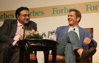 Mel Gibson and Vinod Sekhar at the Forbes Global CEO Conference.