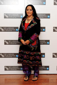 Ila Arun at the photocall of "West Is West" during the 54th BFI London Film Festival.