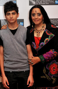 Aqib Khan and  Ila Arun at the photocall of "West Is West" during the 54th BFI London Film Festival.
