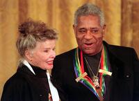 Katharine Hepburn and Dizzy Gillespie at the White House reception.
