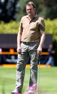 Philip Glenister at the par-3 celebrity golf tournament.