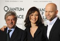 Giancarlo Giannini, Olga Kurylenko and Director Marc Forster at the photocall of "Quantum of Solace."