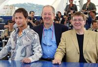 Stephane Rousseau, Denys Arcand and Remy Girard at the photocall of "Les Invasions barbares" during the 56th Cannes film festival.