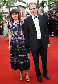 Hippolyte Girardot and Guest at the screening of "Paris Je T'aime" during the 59th International Cannes Film Festival.