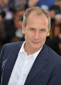 Hippolyte Girardot at the photocall of "Un Conte De Noel" during the 61st Cannes International Film Festival.