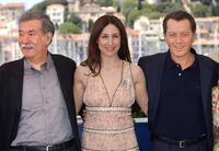Bernard Giraudeau, Elsa Zylberstein and Raoul Ruiz at the Palais des Festivals for the photocall of "Ce Jour-La" during the 56th Cannes Film Festival.