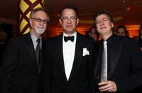 Gary Goetzman, Tom Hanks and Guest at the after party of 66th Annual Golden Globe Awards.